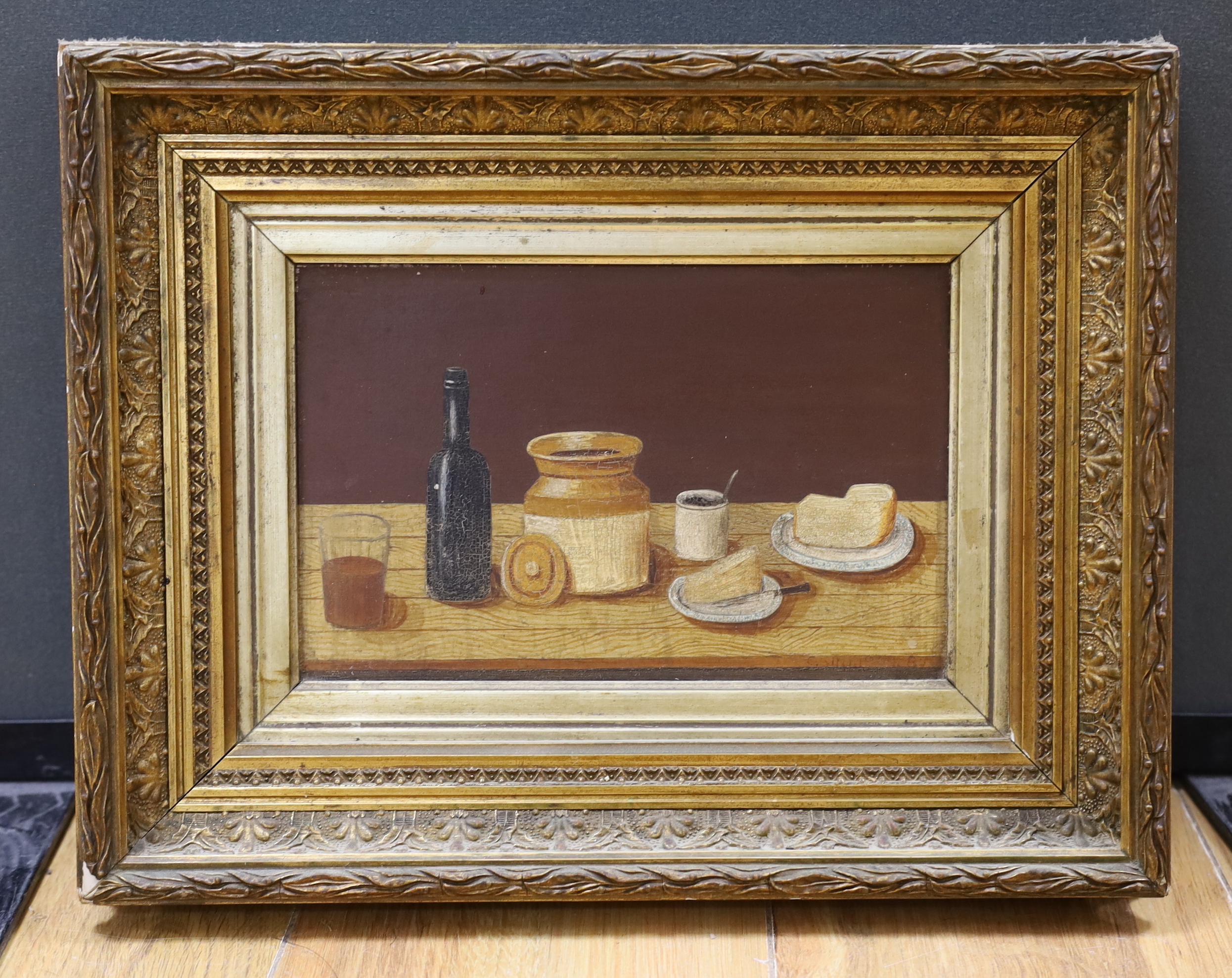 Continental School, oil on board, Table top Still life, indistinctly signed and dated, 14 x 22cm